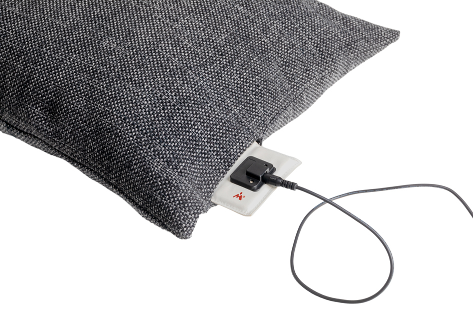 Coussin chauffant à infrarouge, port de charge